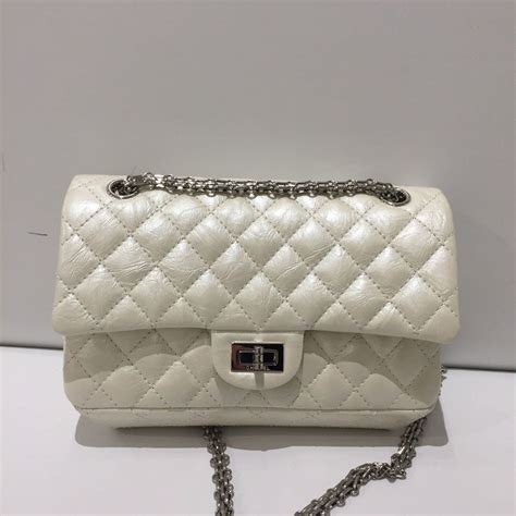 chanel 225 pearl white reissue|Chanel reissue bag.